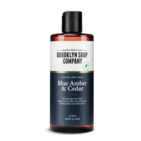 Das Blue Amber & Cedar Body Wash von der Brooklyn Soap Company sorgt mit Panthenol und Vitamin E für eine sanfte Reinigung von Haut und Haar. Das 2-in-1 Duschgel spendet Feuchtigkeit, schützt die Haut und hinterlässt einen frischen, fruchtigen Duft mit Amber- und Kräuternoten.